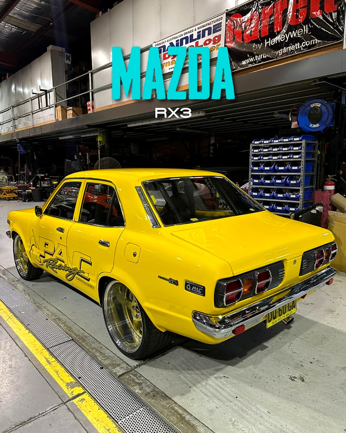 Yellow Mazda RX3 after a full paint correction